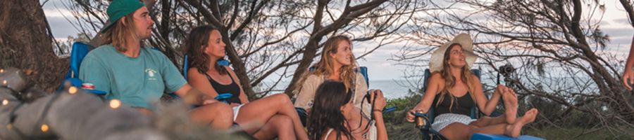 travellers chatting at a campsite in australia