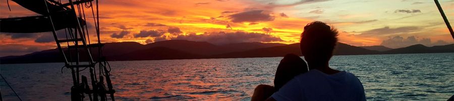 couple watching the sunset aboard Providence Sunset Sail