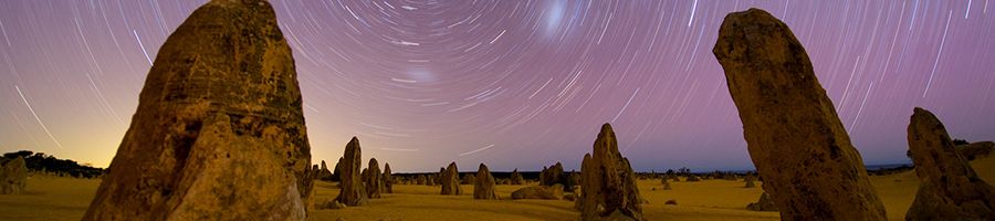 pinnacles limestone formations in front of starry night sky