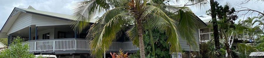 beach house with palm trees on k'gari fraser island