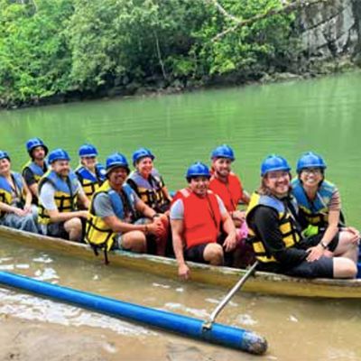 travellers in a boat on the underground river palawan