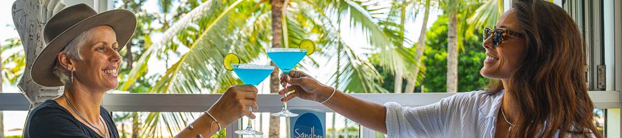 Two women having cocktails at a restaurant