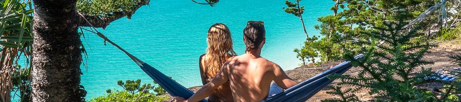 A couple on Whitsunday Island during a trip on Whitsunday Pearl