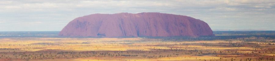 An aerial shot of Uluru taken from a scenic helicopter flight