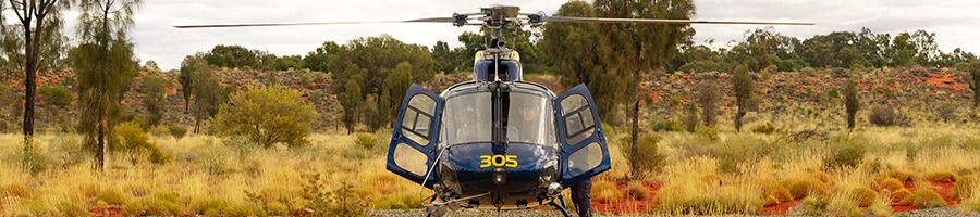 PHS helicopter in the Outback of Australia, about to take off