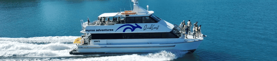 The QuickCoast boat taking passengers back to Cairns