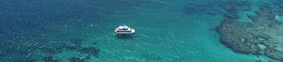 The Quick Coast boat taking passengers out to the Great Barrier Reef