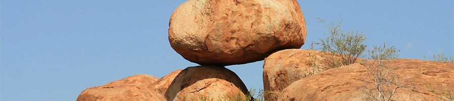 devils marbles brown rocks stacked on eachother