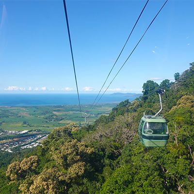 skyrail cable car traveling over kuranda rainforests