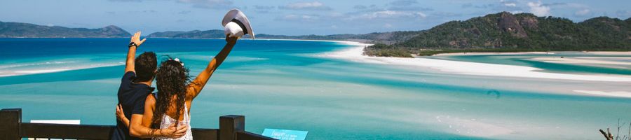 couple posing at hill inlet lookout whitsundays