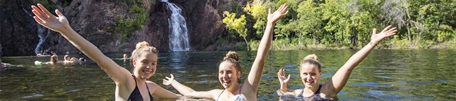 girls posing in litchfield national park waterfalls