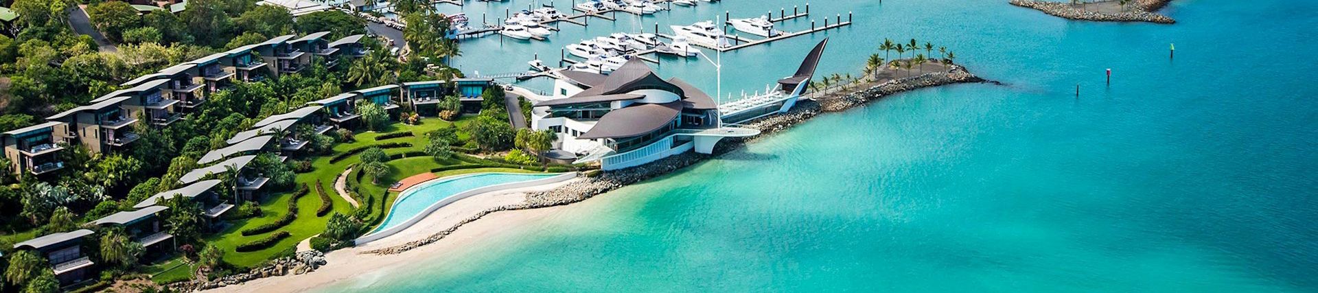 aerial view of hamilton island yacht club villas and marina