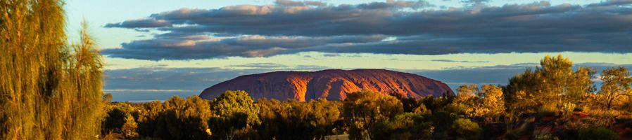 Uluru from afar on a scenic flight