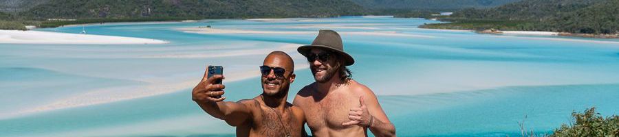 two guys posing at hill inlet lookout in the whitsundays