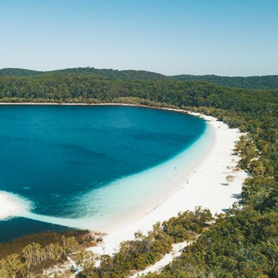 Lake Mackenzie Drone Shot with trees, blue water and sand